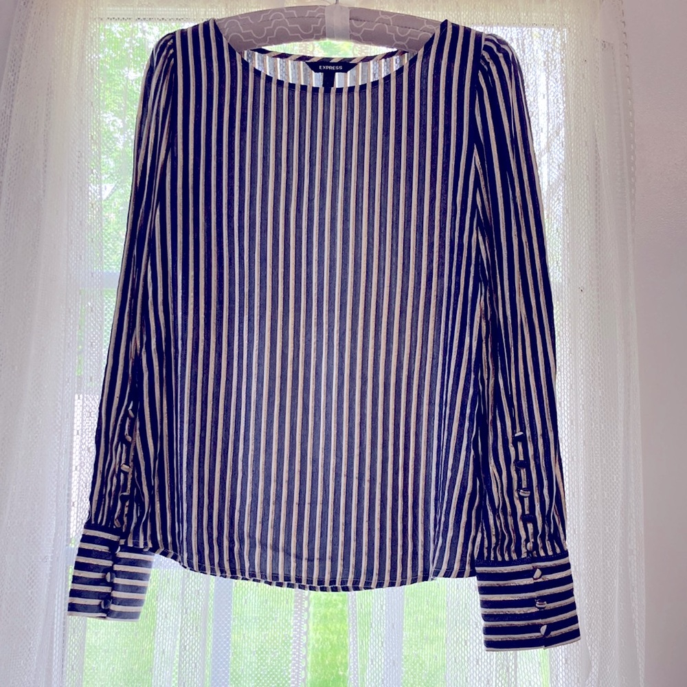 Blue/whit/gold stripes with classic button down sleeves. Size XS